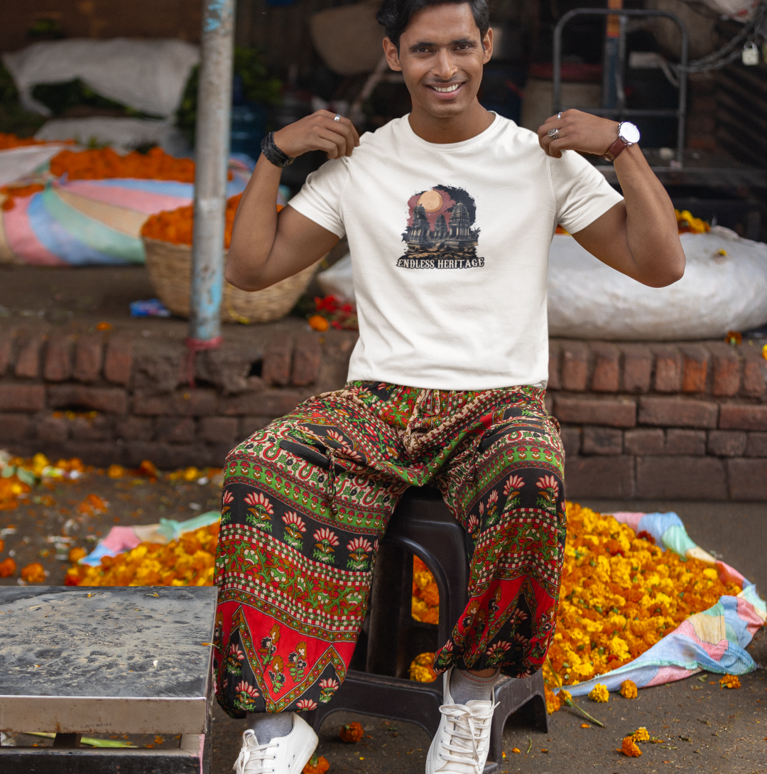 scott-international-tee-mockup-of-a-happy-man-sitting-on-a-stool-at-a-street-market-m37561